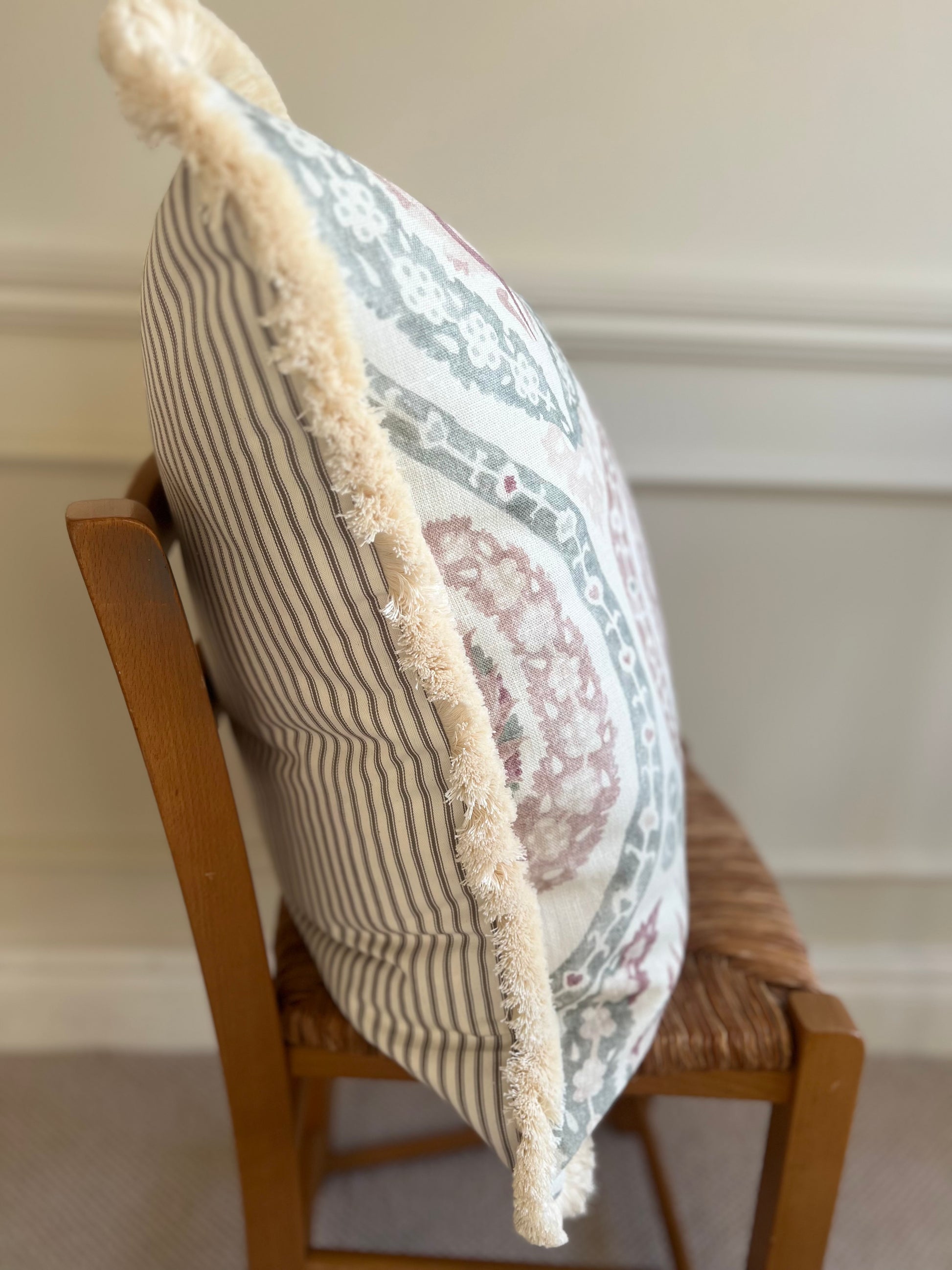 Luxury patterned cushions in Lewis & Wood Benaki Rock Rose designer fabric