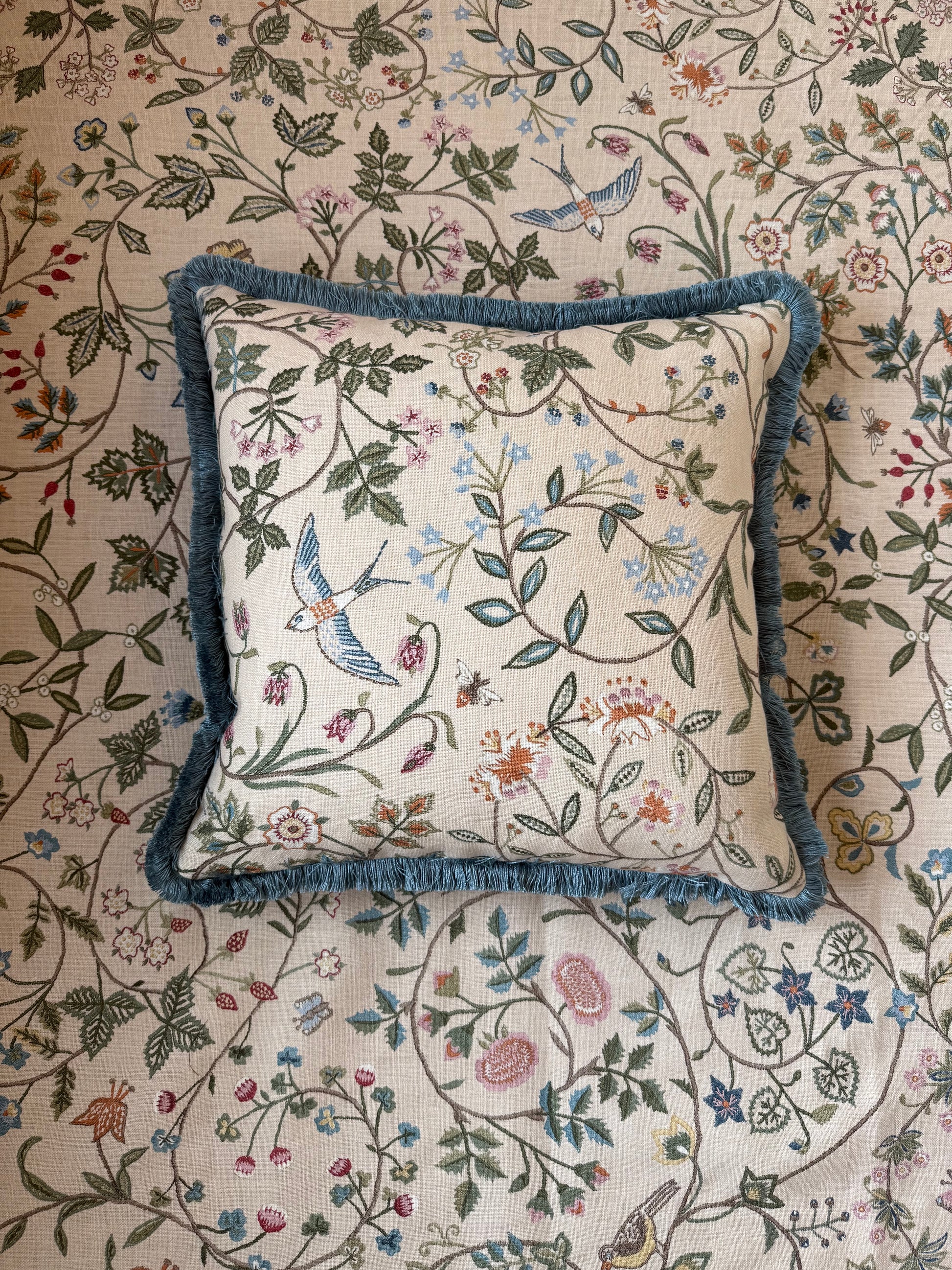 Luxury designer fringed cushion in Lewis & Wood Windrush Classic patterned fabric 