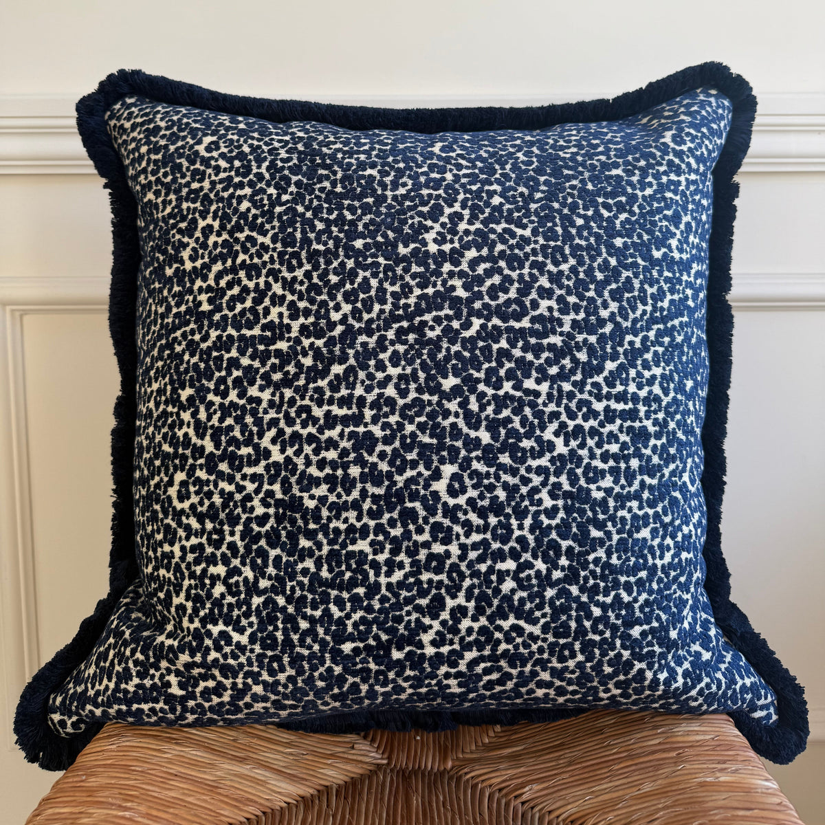 Fringed cushion in Pierre Frey Navy Mini Leopard fabric 