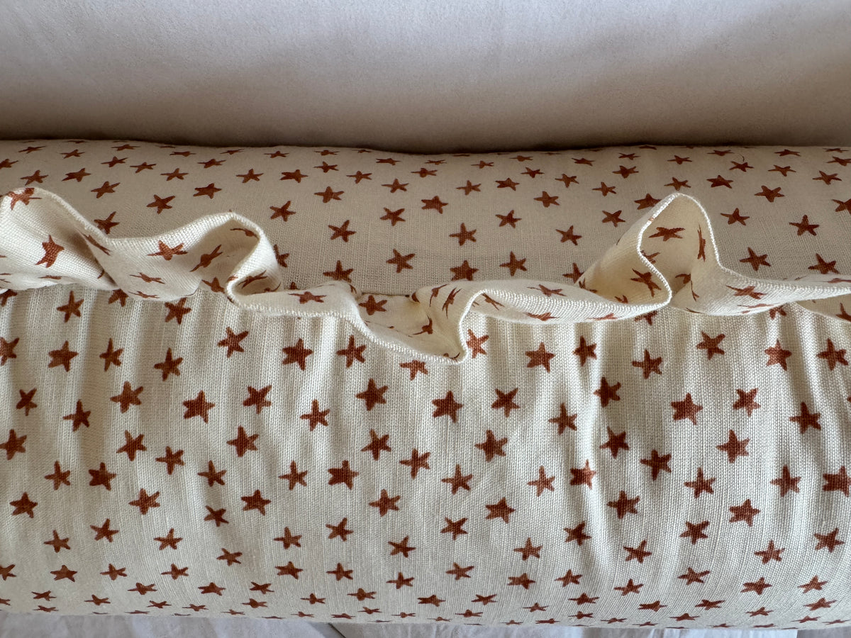 ‘Bigger Than the Baby’ Chelsea Textiles Stars Rust Cushion
